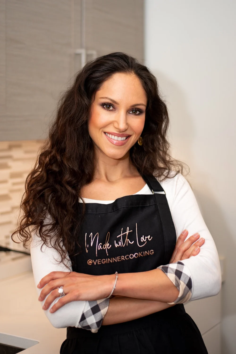 Cheryl Martinez smiling in her Veginner Cooking apron